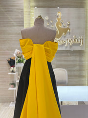 A comfortable and stylish knee-length dress with sleeves, perfect for a family gathering